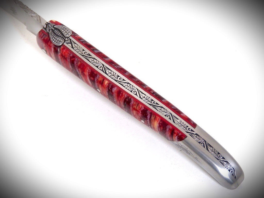Laguiole Molaire de Mammouth Rouge, Mitre arrière gravée ciselé par David DAUVILLAIRE