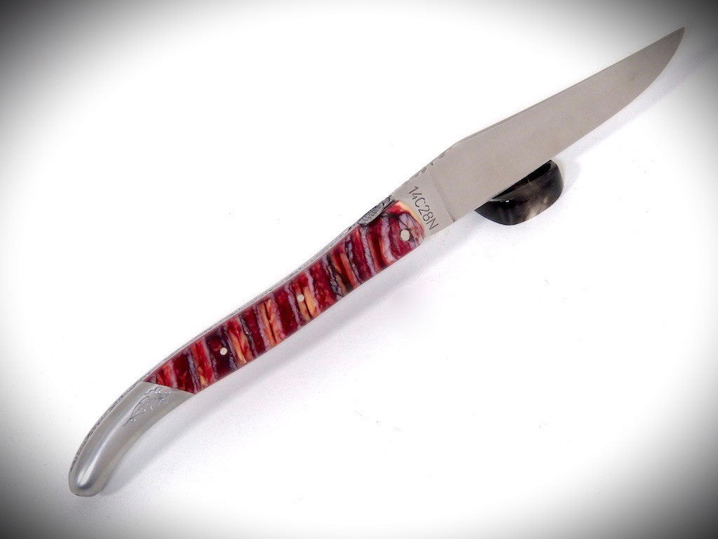 Laguiole Molaire de Mammouth Rouge, Mitre arrière gravée ciselé par David DAUVILLAIRE