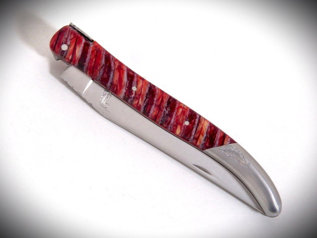 Laguiole Molaire de Mammouth Rouge, Mitre arrière gravée ciselé par David DAUVILLAIRE