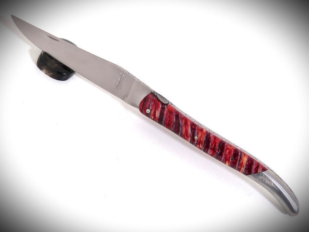 Laguiole Molaire de Mammouth Rouge, Mitre arrière gravée ciselé par David DAUVILLAIRE