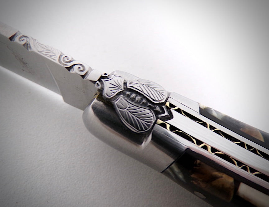 Laguiole Ivoire de Mammouth stabilisé ciselé par David DAUVILLAIRE