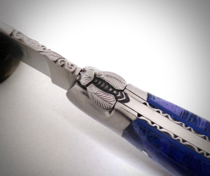 Laguiole Corail fossile ciselé par David DAUVILLAIRE