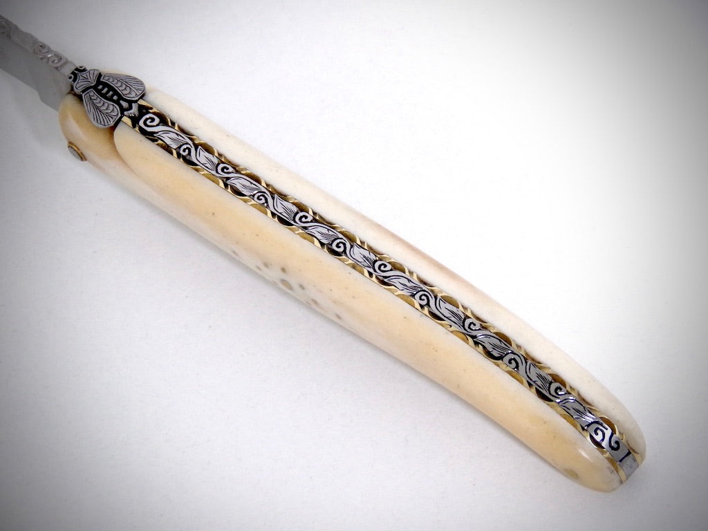 Laguiole Buffalo Bone engraved by David DAUVILLAIRE