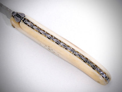 Laguiole Buffalo Bone engraved by David DAUVILLAIRE