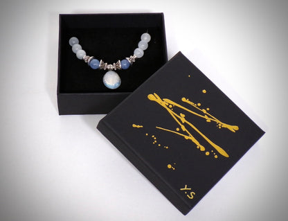 Parure en Perles de nacre et Aigue-marine fabriqué artisanalement par Y.S CRÉATIONS
