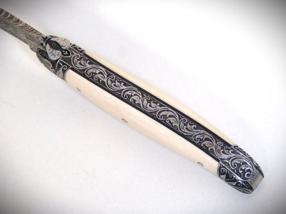 Laguiole "Acanthus" Mammoth Ivory, engraved bolsters, Damascus feather blade