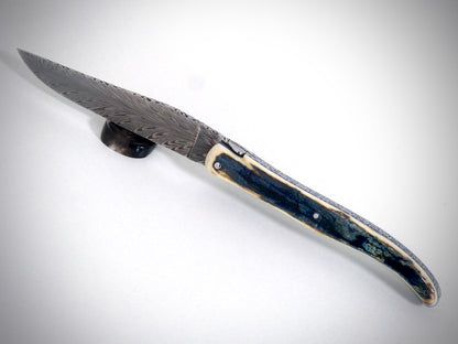 Laguiole Blue Mammoth Ivory Crust, Damascus Plume blade chiseled by David DAUVILLAIRE