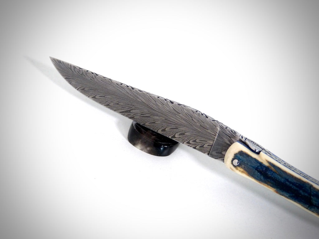 Laguiole Blue Mammoth Ivory Crust, Damascus Plume blade chiseled by David DAUVILLAIRE