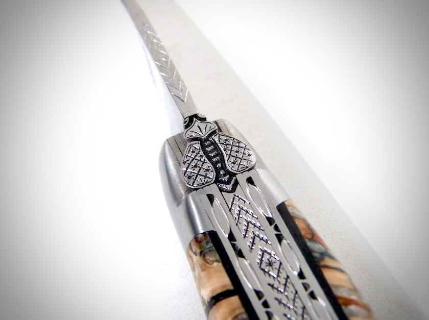 Laguiole Molaire de Mammouth ciselé par David DAUVILLAIRE